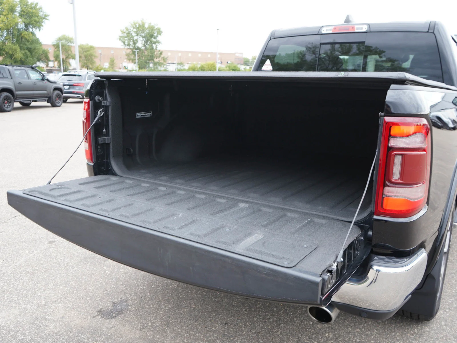 Used 2021 Diamond Black Crystal Pearlcoat Ram Laramie 4x4 V8 Crew Cab 5
