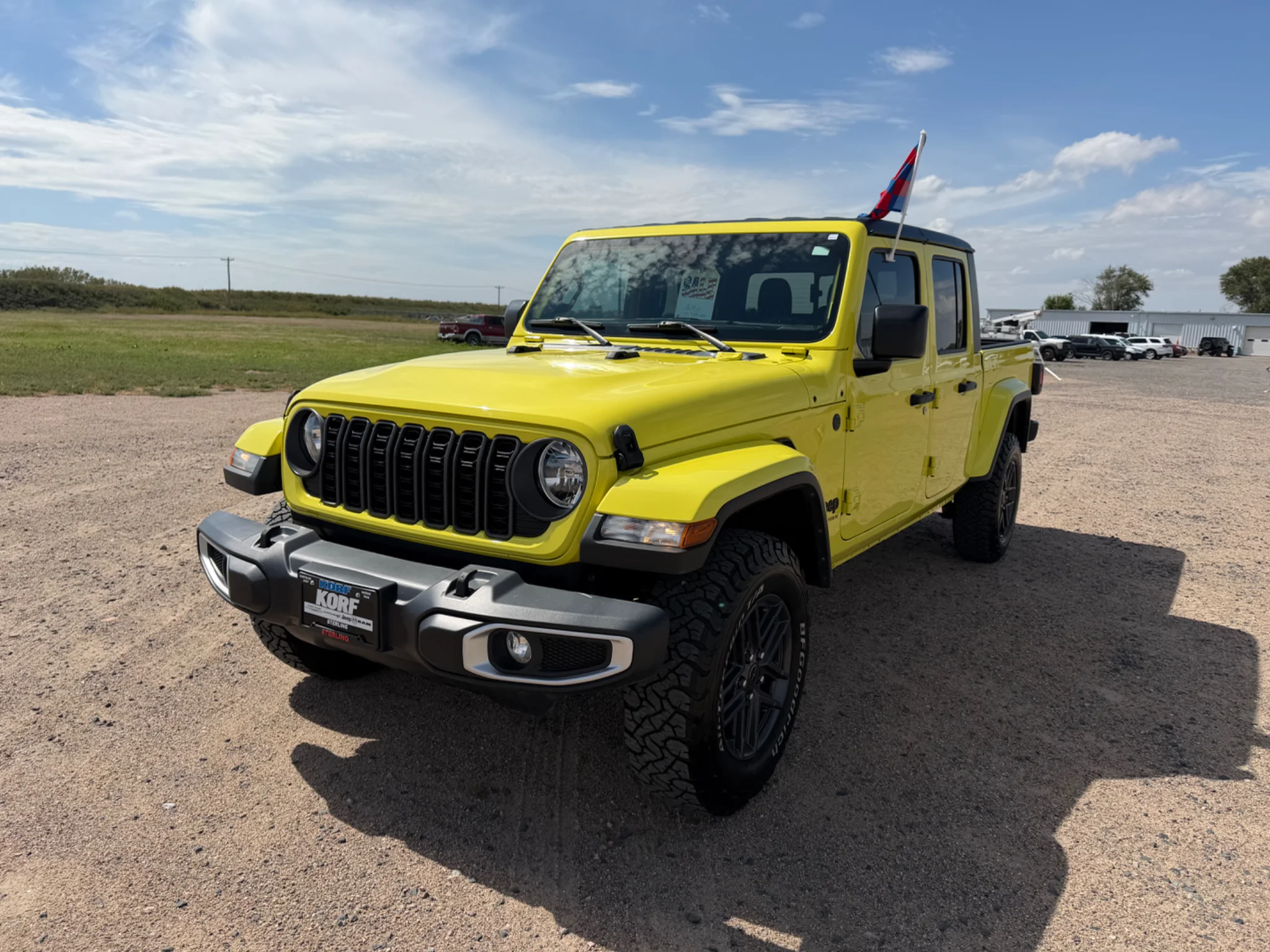 Used 2024 High Velocity Clearcoat Jeep Sport S image 1