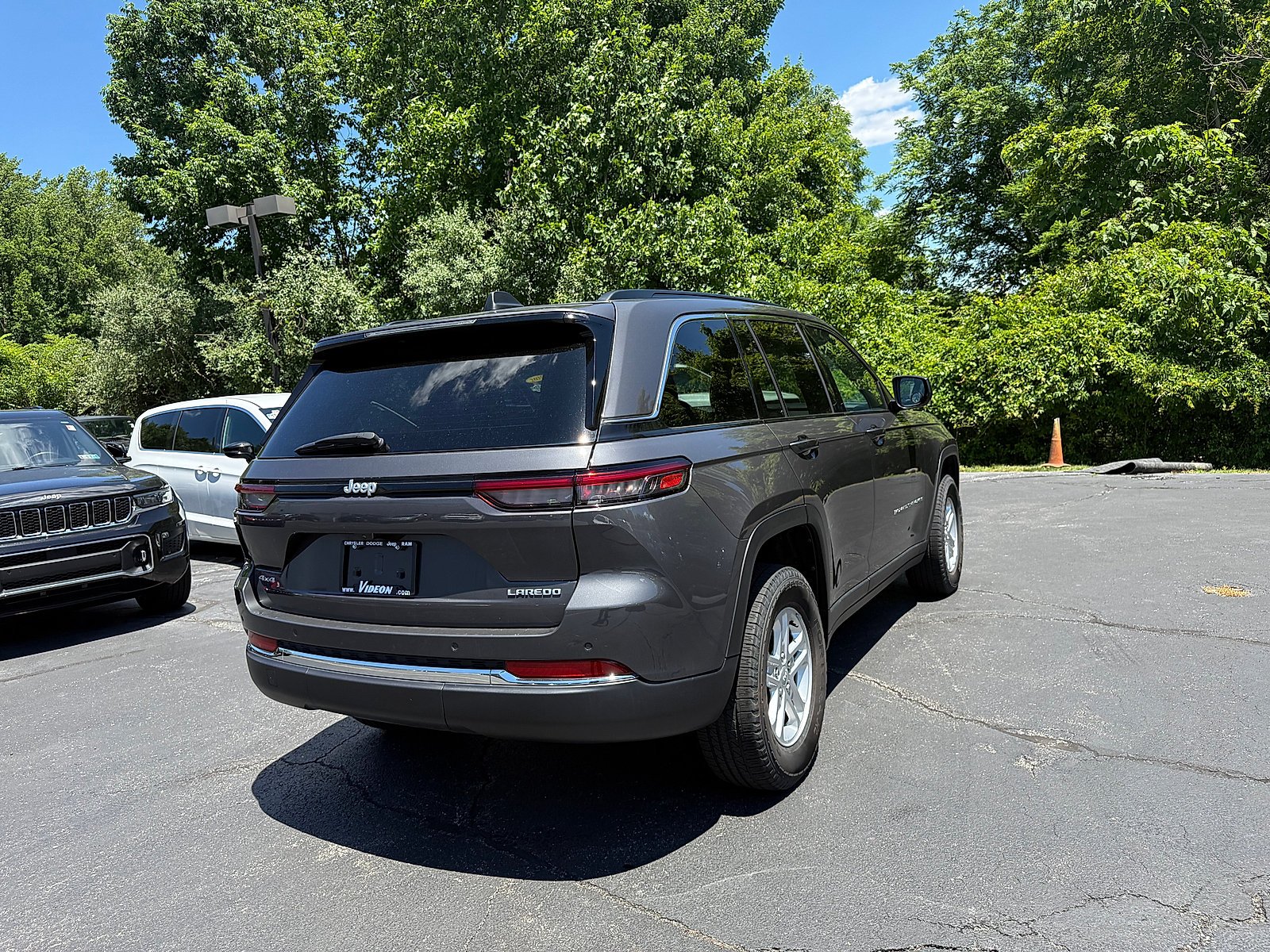 Used 2025 Baltic Gray Metallic Clearcoat Jeep Laredo image 6