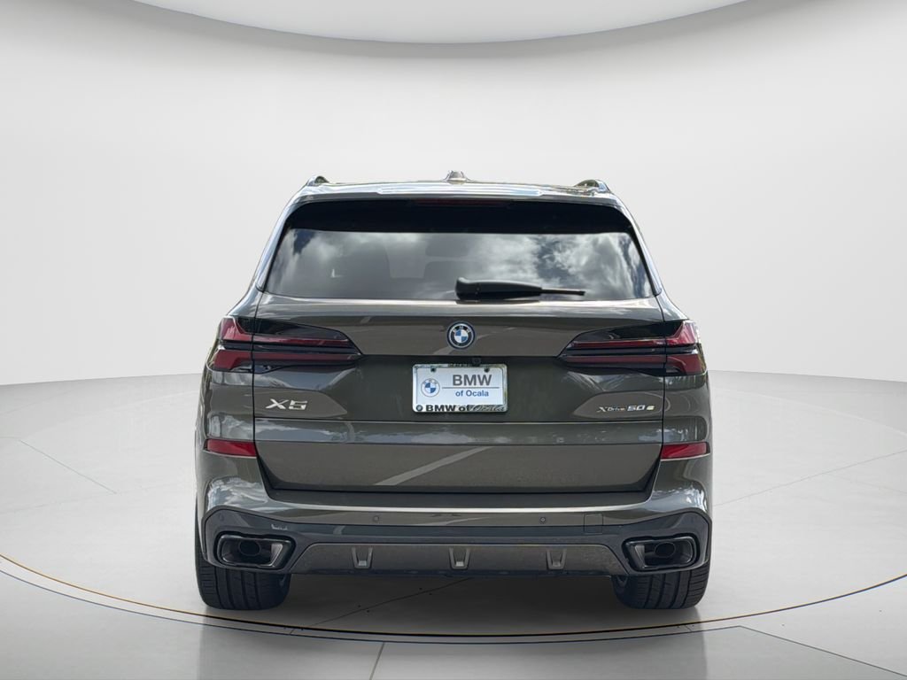 Certified Used 2026 Manhattan Green Metallic BMW xDrive50e image 2
