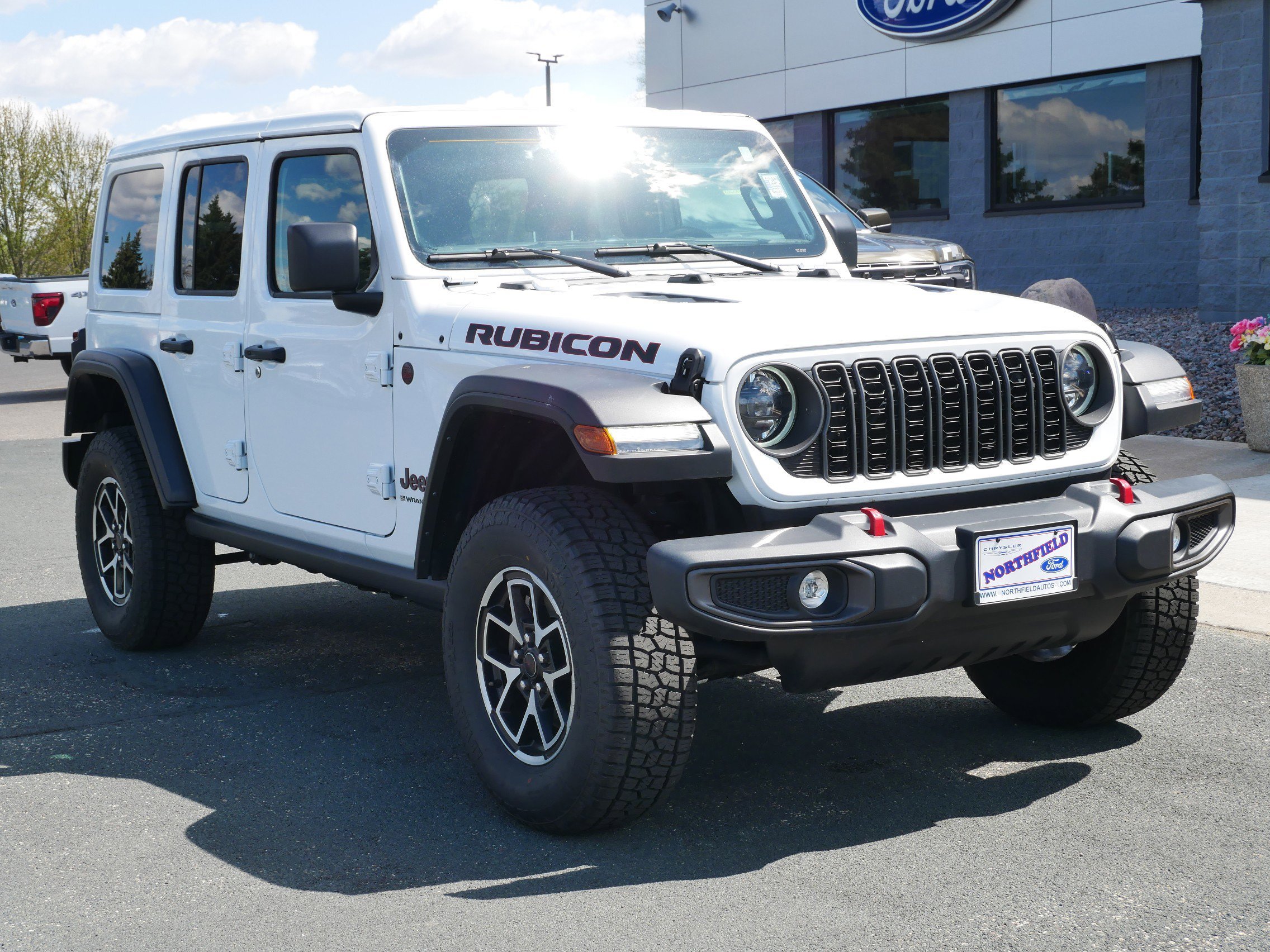 Used 2025 Jeep Wrangler 4-Door Rubicon with VIN 1C4PJXFN7SW521420 for sale in Northfield, Minnesota