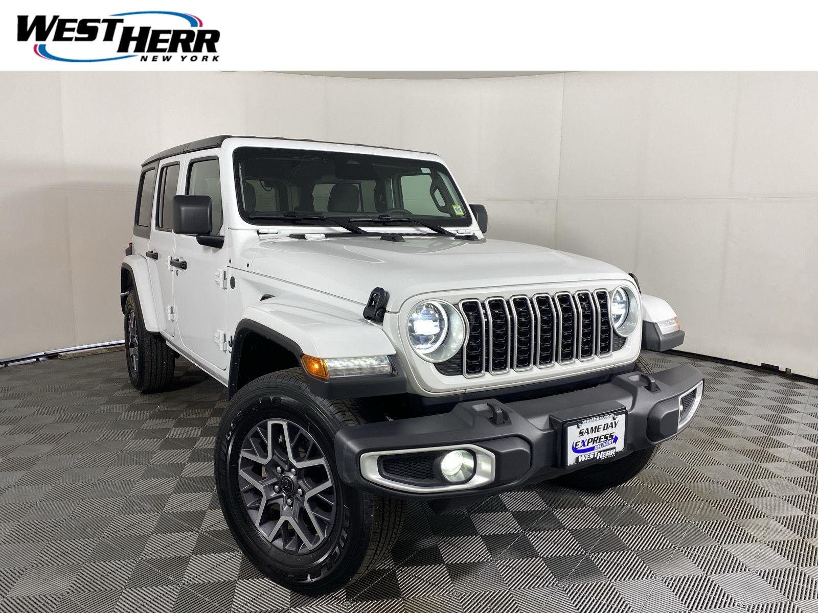 Used 2026 Bright White Jeep Sahara image 1