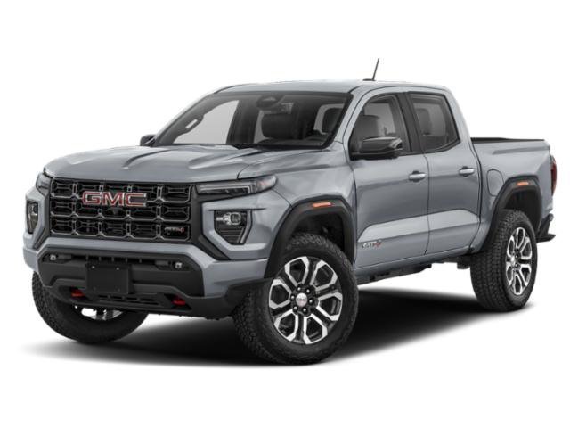 Used 2024 Summit White GMC 4WD AT4 image 1