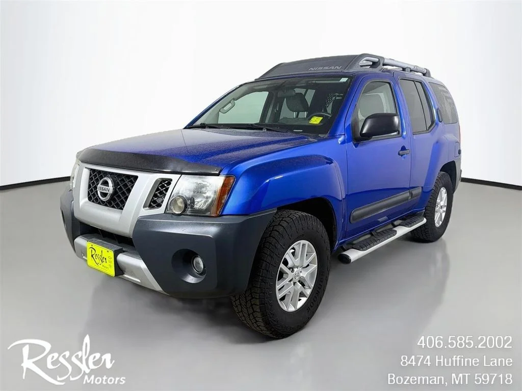 Used 2015 Blue Nissan S image 1