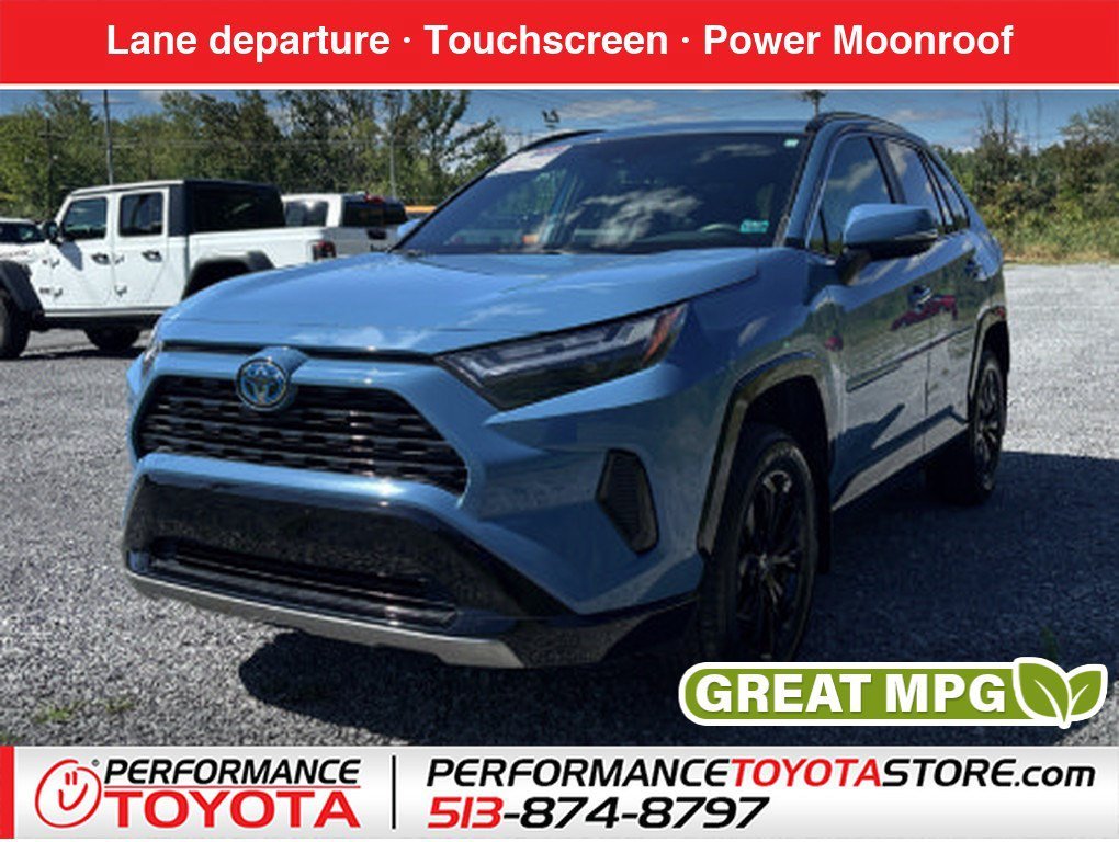 Used 2023 Cavalry Blue Toyota Hybrid SE image 1
