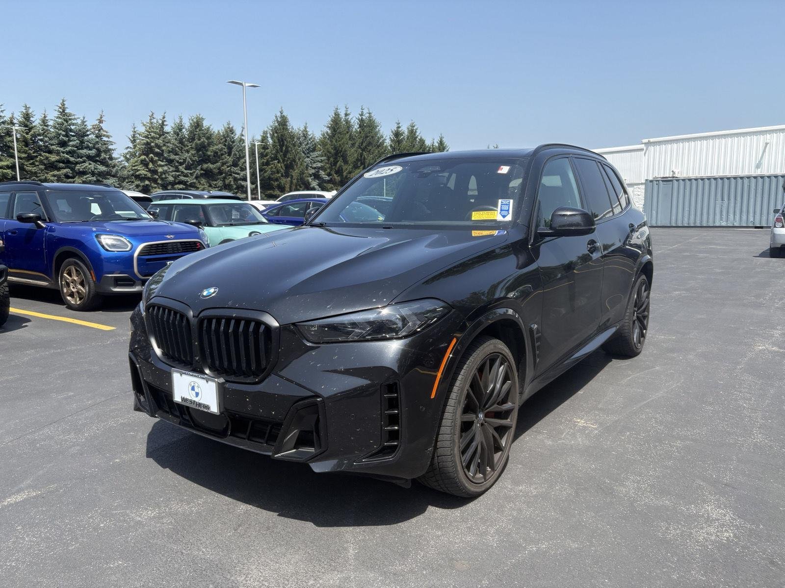 Certified Used 2025 Black Sapphire Metallic BMW xDrive40i image 6