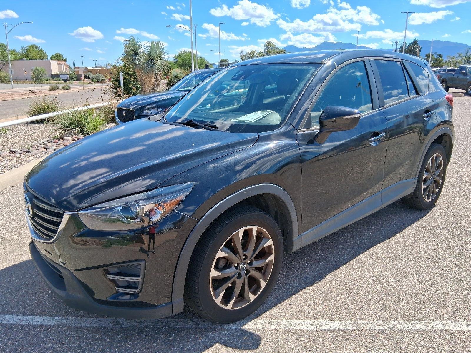 Used 2016 Jet Black Mica Mazda Grand Touring image 1