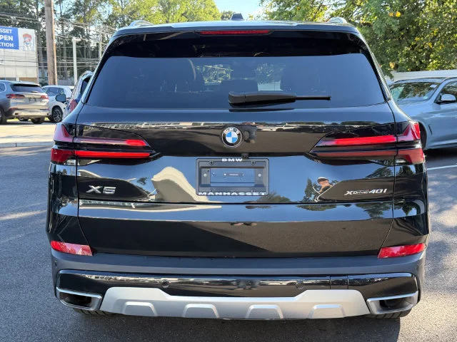 Certified Used 2024 Black Sapphire Metallic BMW xDrive40i image 5