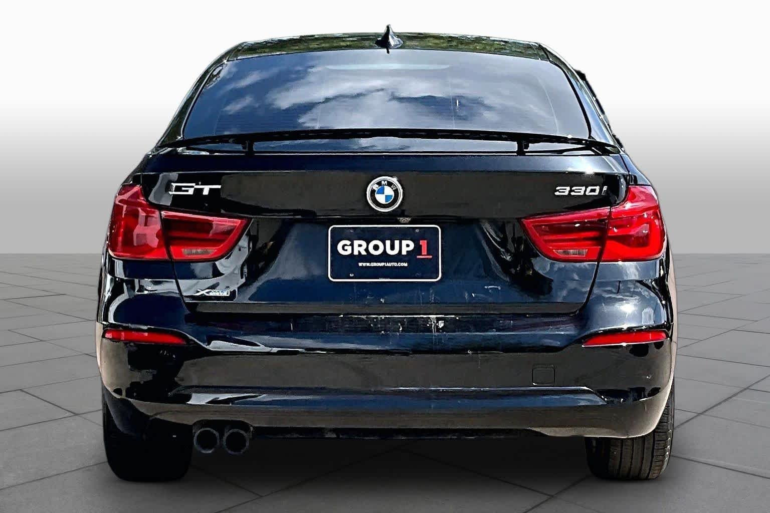 Used 2018 Black Sapphire Metallic BMW 330i xDrive image 4