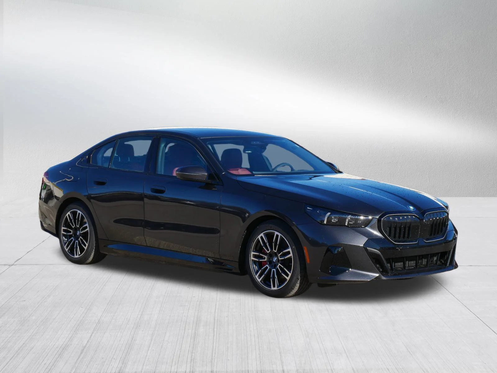 2026 BMW 5 Series 550e xDrive Sedan's photo
