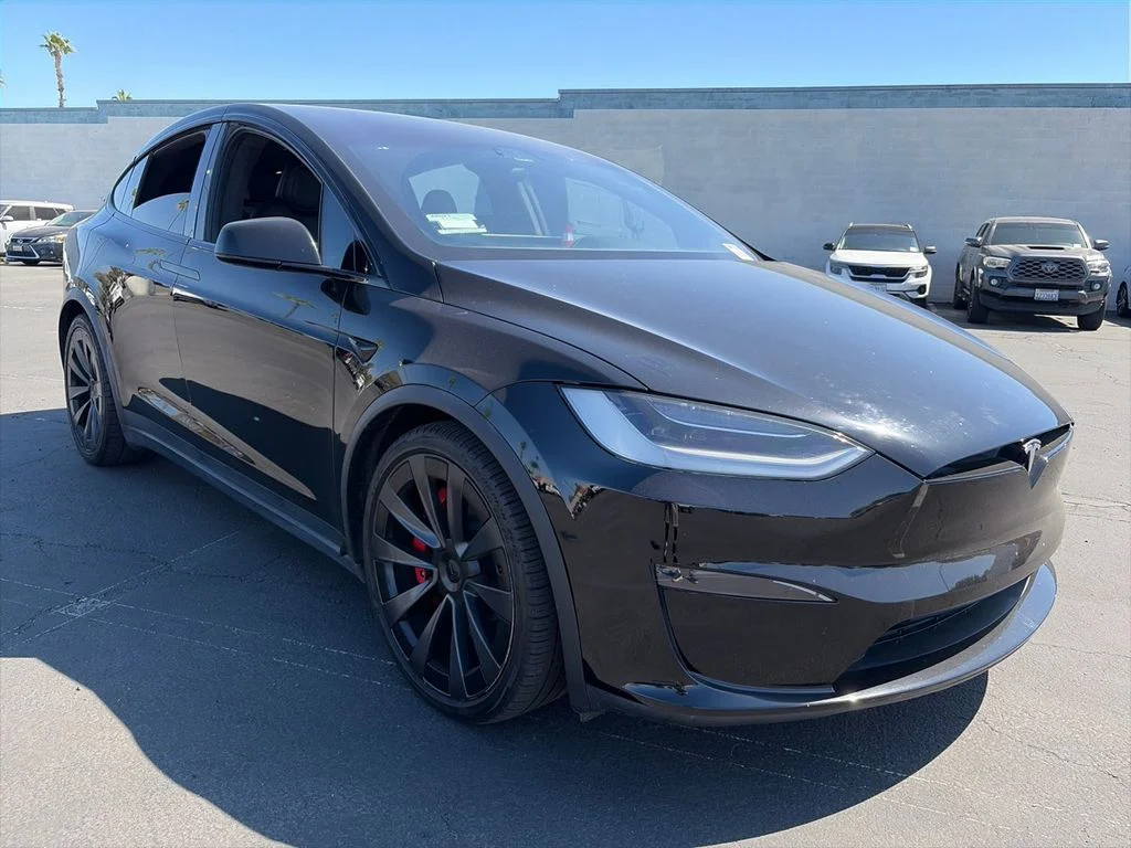 Used 2023 Solid Black Tesla Plaid image 3