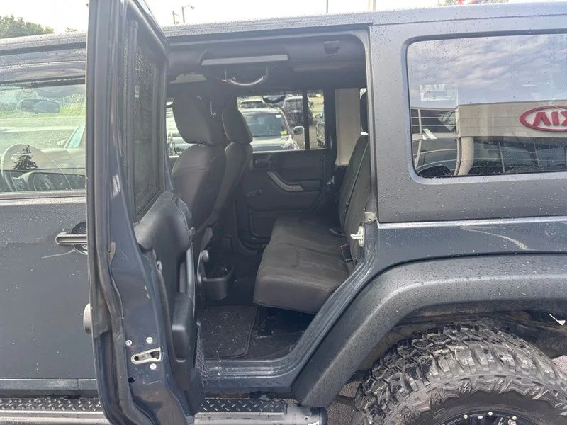 Used 2017 Black Jeep Unlimited Sport image 10