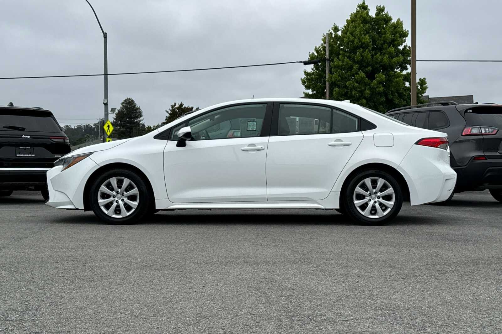 Used 2023 White Toyota LE image 7