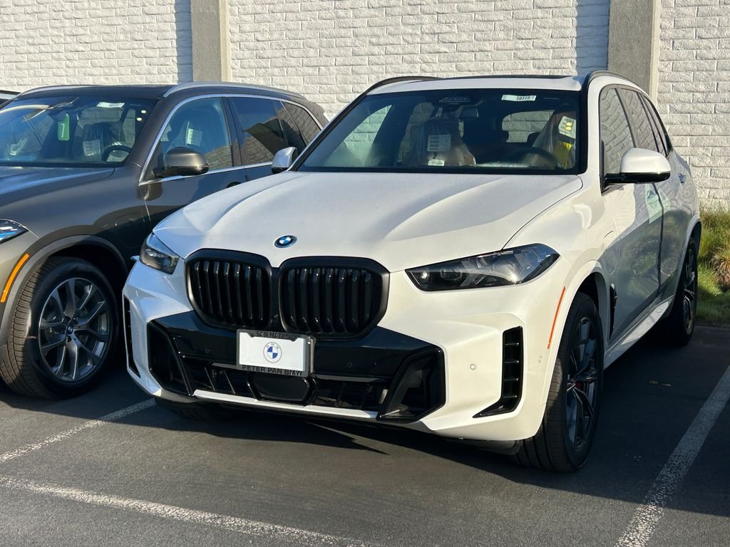 New 2026 Mineral White Metallic BMW xDrive50e image 2