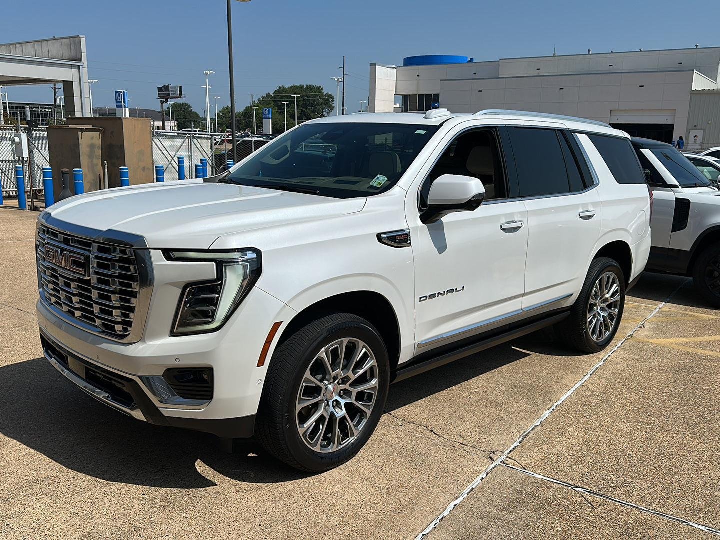 Used 2025 White Frost Tricoat GMC Denali image 1