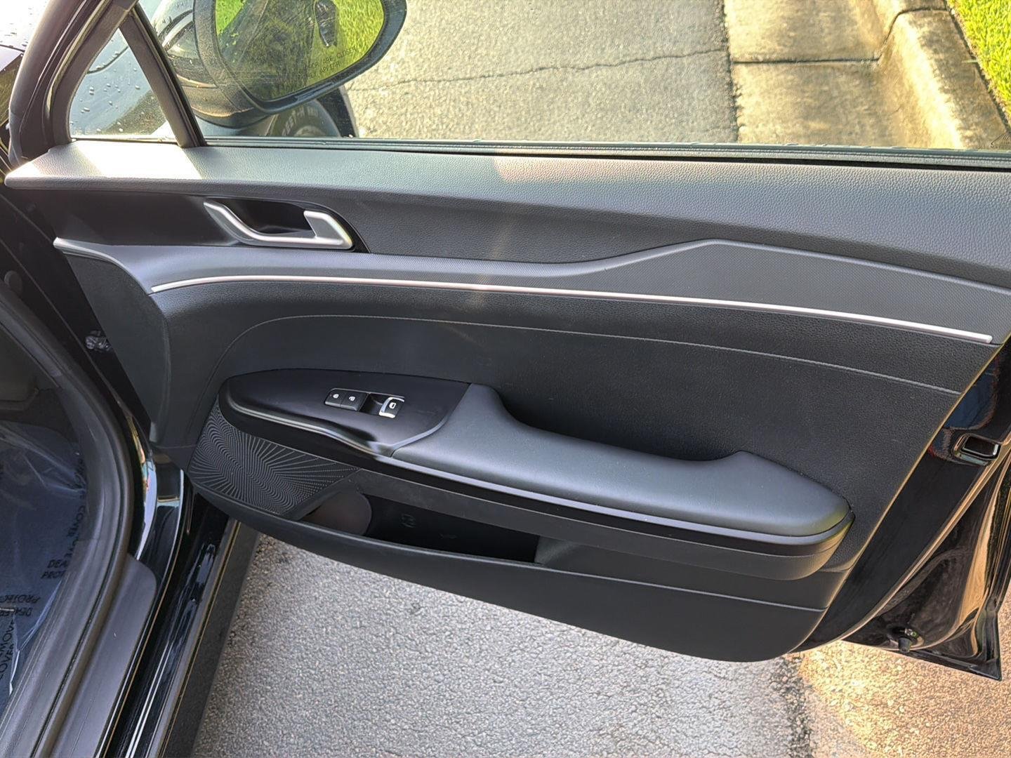 Used 2024 Ebony Black Kia LXS image 12