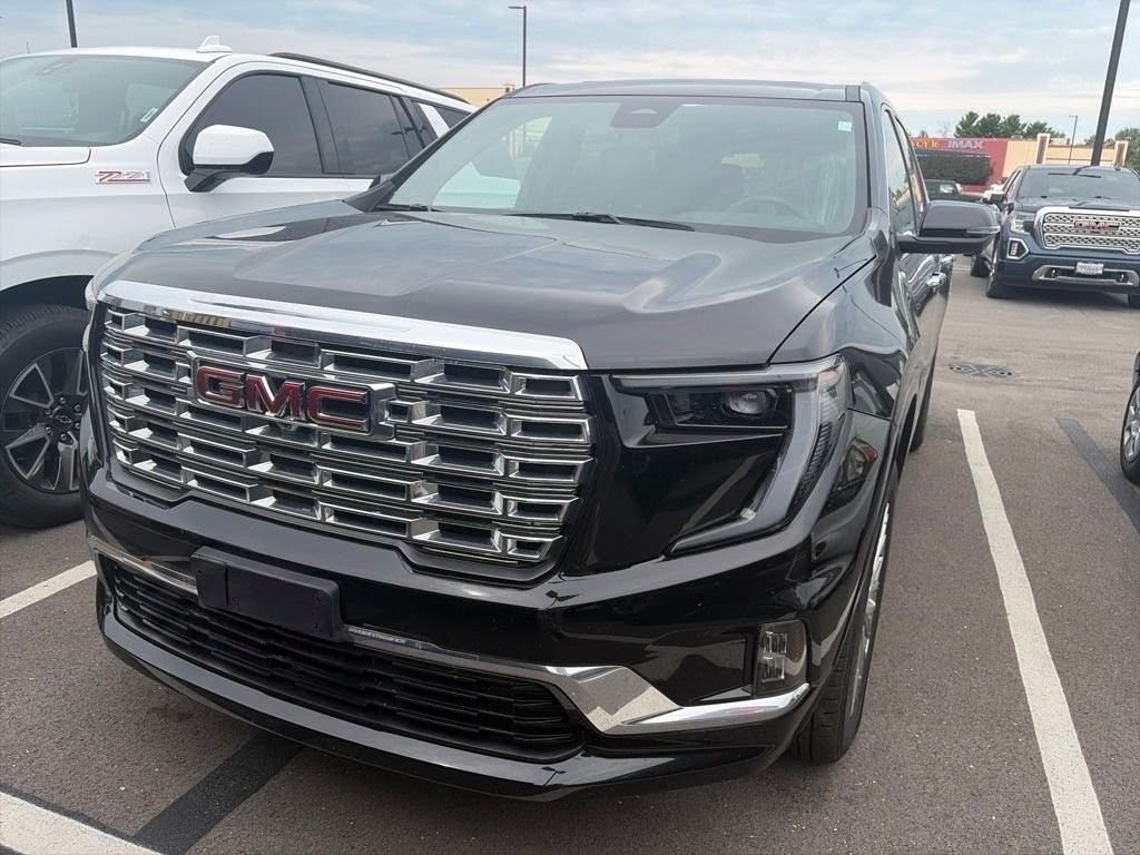 Used 2024 Ebony Twilight Metallic GMC Denali image 1