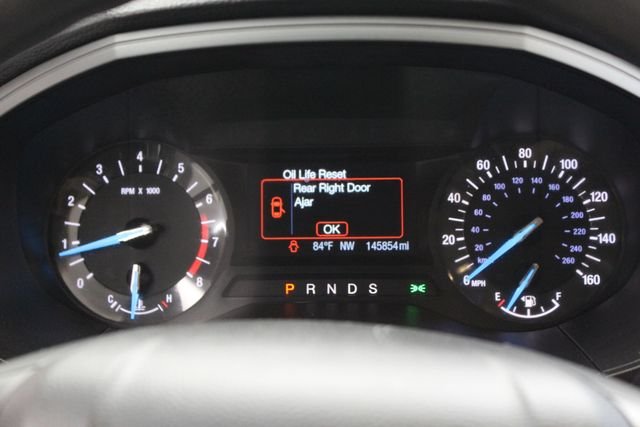 Used 2016 Magnetic Metallic Ford SE image 19