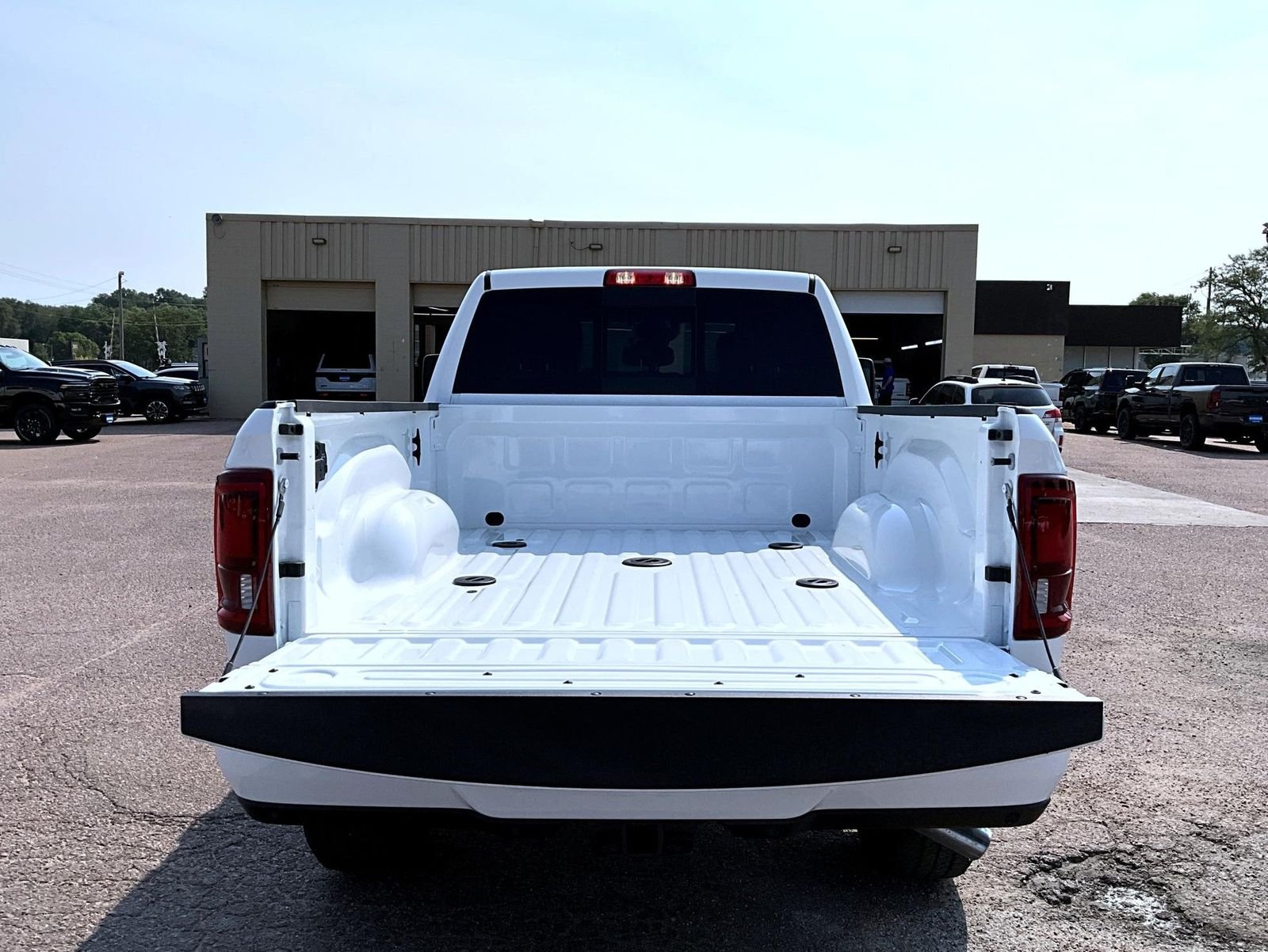 New 2026 Bright White Clear-Coat Exterior Paint RAM Laramie image 9