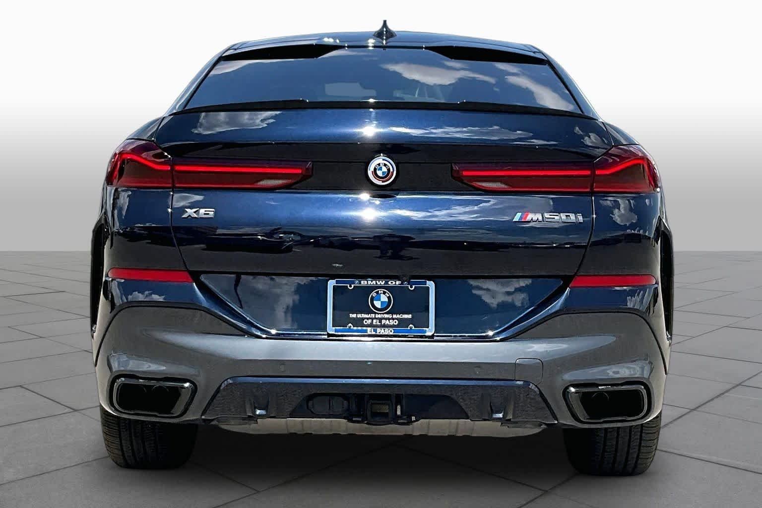 Used 2023 Carbon Black Metallic BMW M50i image 4