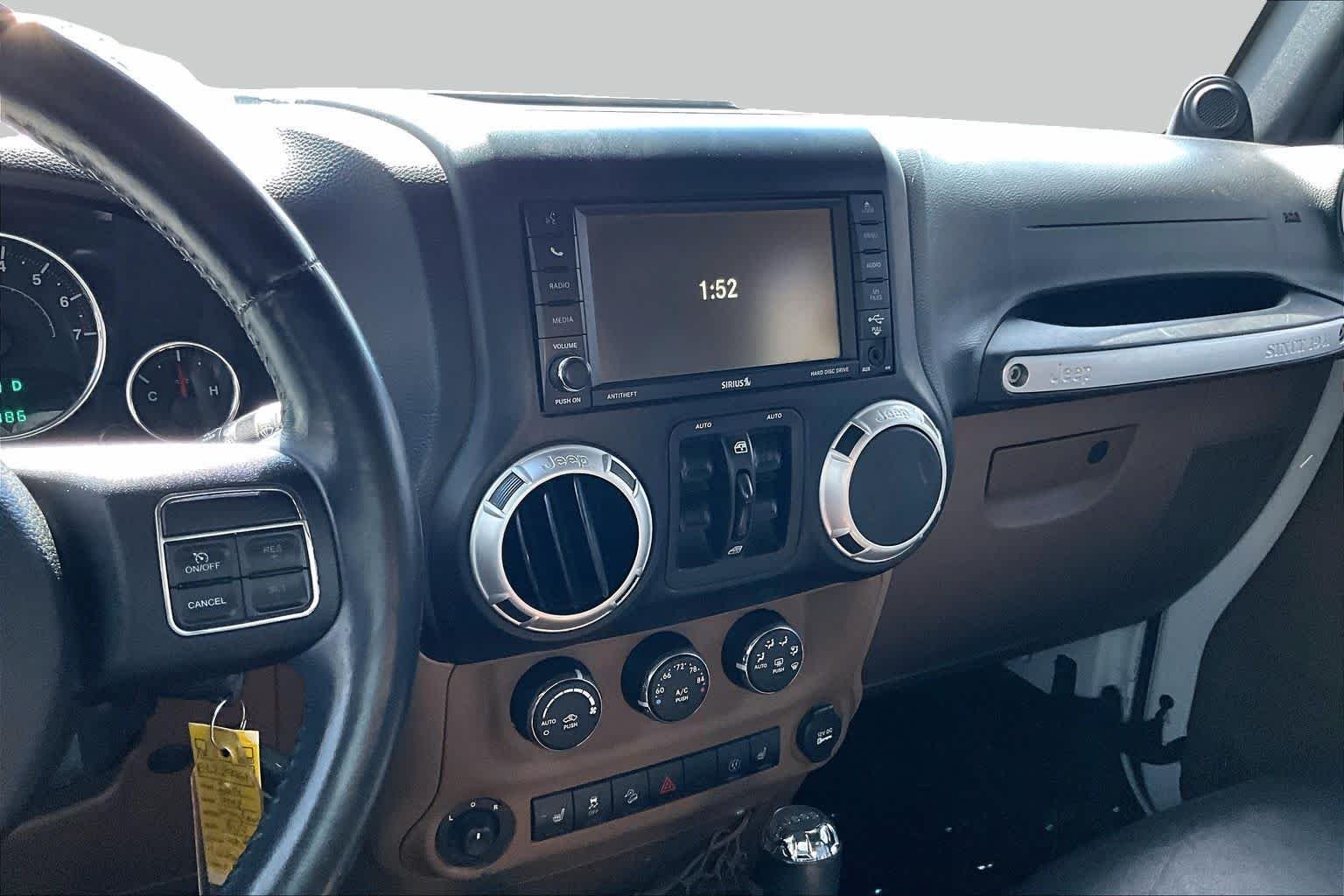 Used 2014 Bright White Clearcoat Jeep Sahara image 6