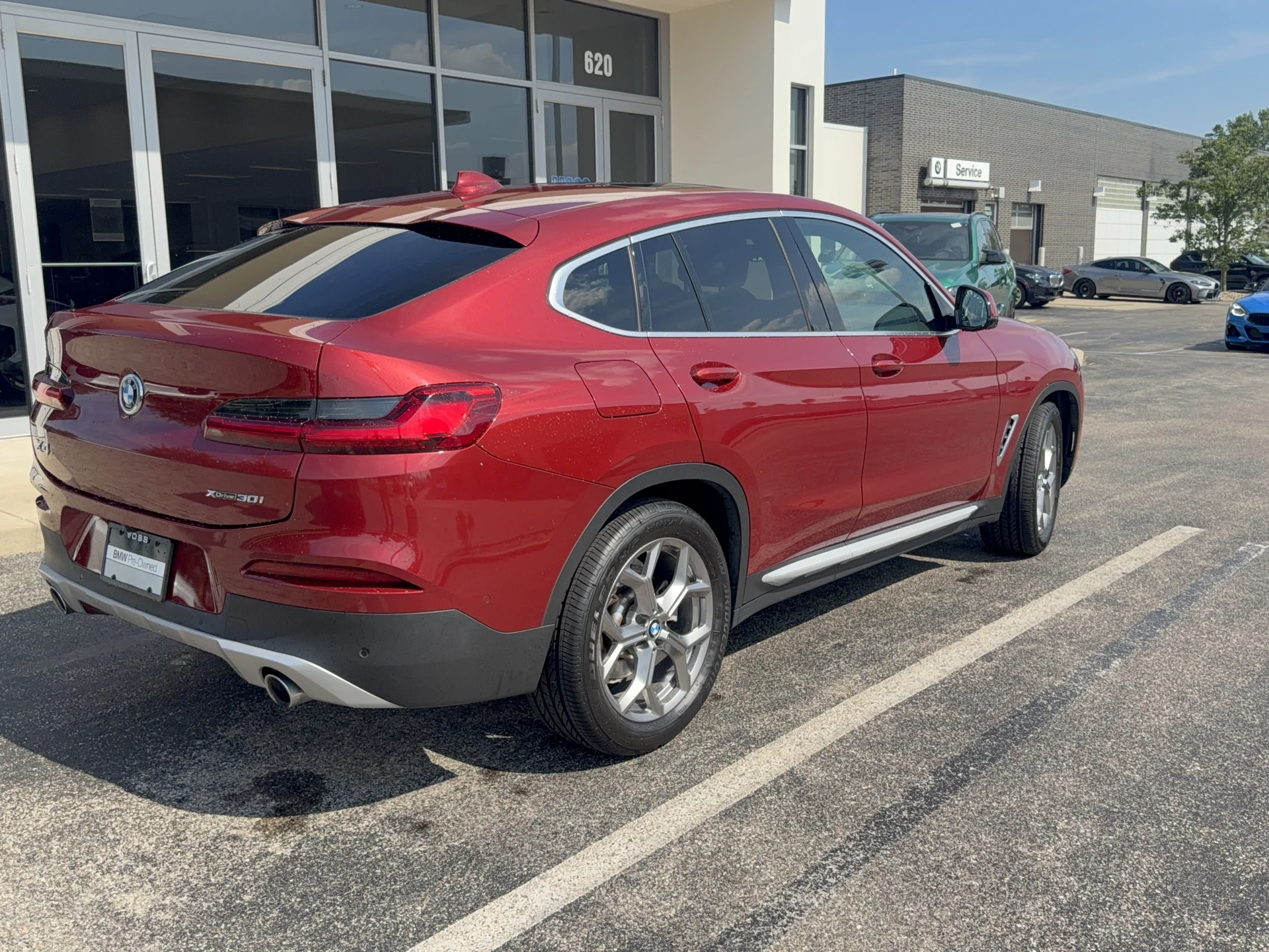 Used 2021 Flamenco Red Metallic BMW xDrive30i image 3