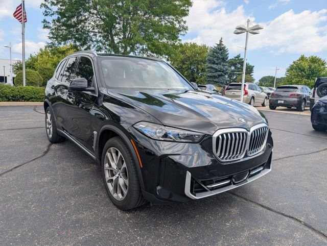 Certified Used 2024 Black Sapphire Metallic BMW xDrive40i image 7