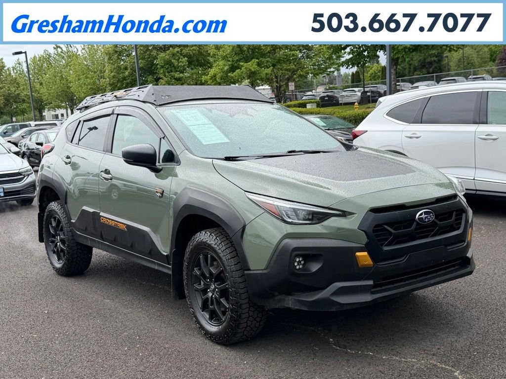 Used 2024 Alpine Green Subaru Wilderness image 1