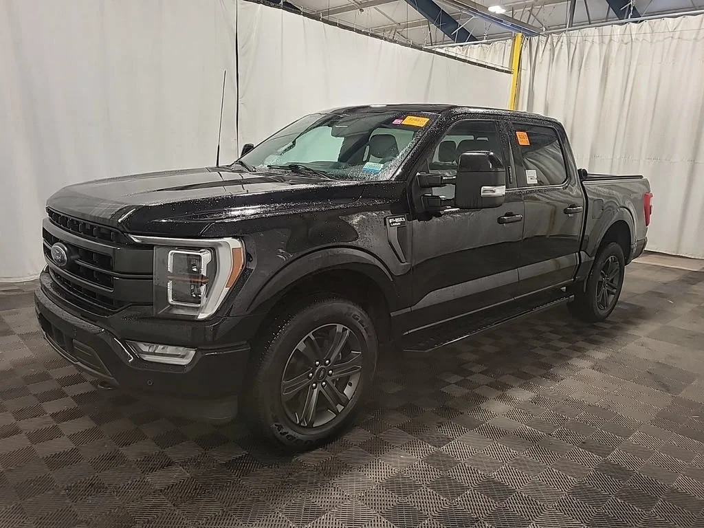 Used 2023 Agate Black Metallic Ford Lariat image 2