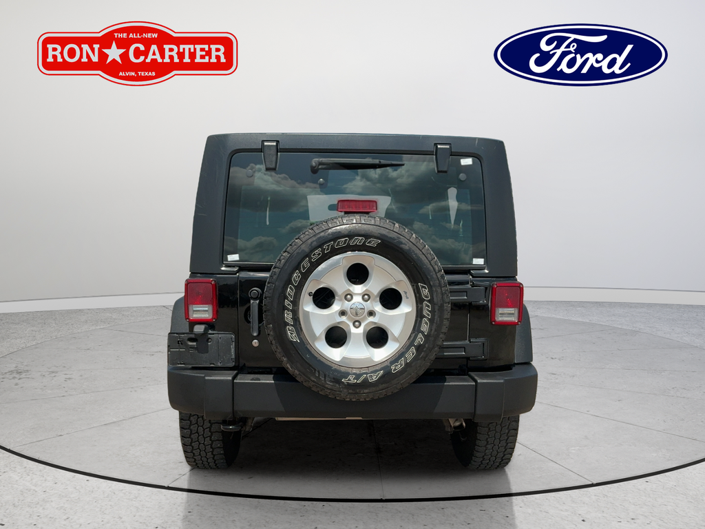 Used 2013 Black Jeep Unlimited Sport image 5