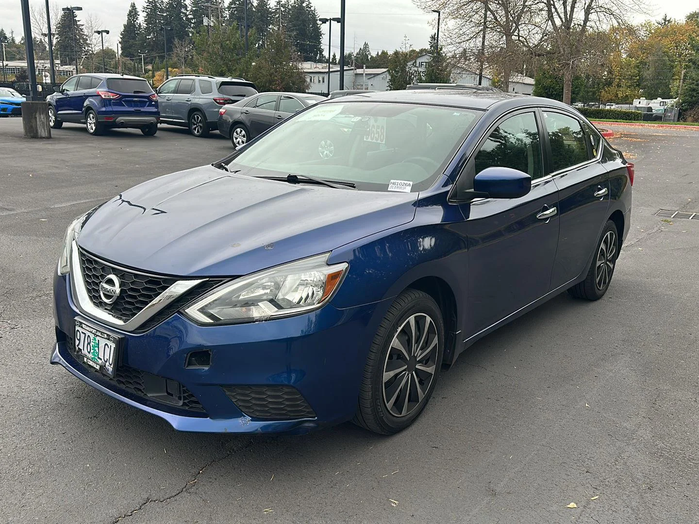Used 2019 Deep Blue Pearl Nissan S image 1