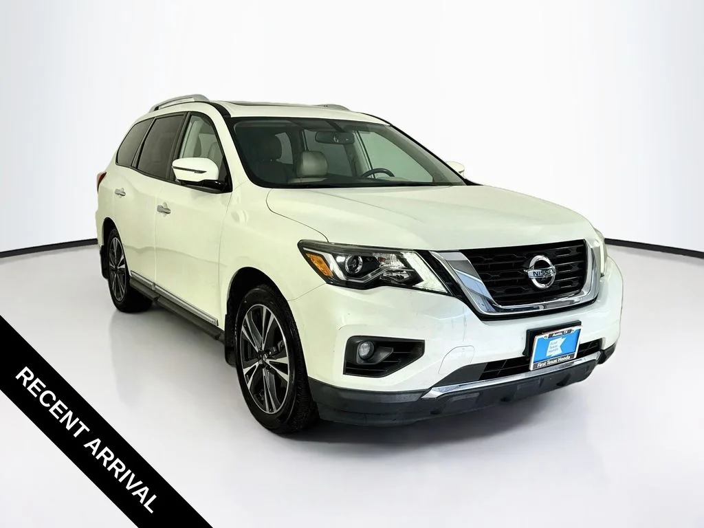 Used 2017 Pearl White Nissan Platinum image 1