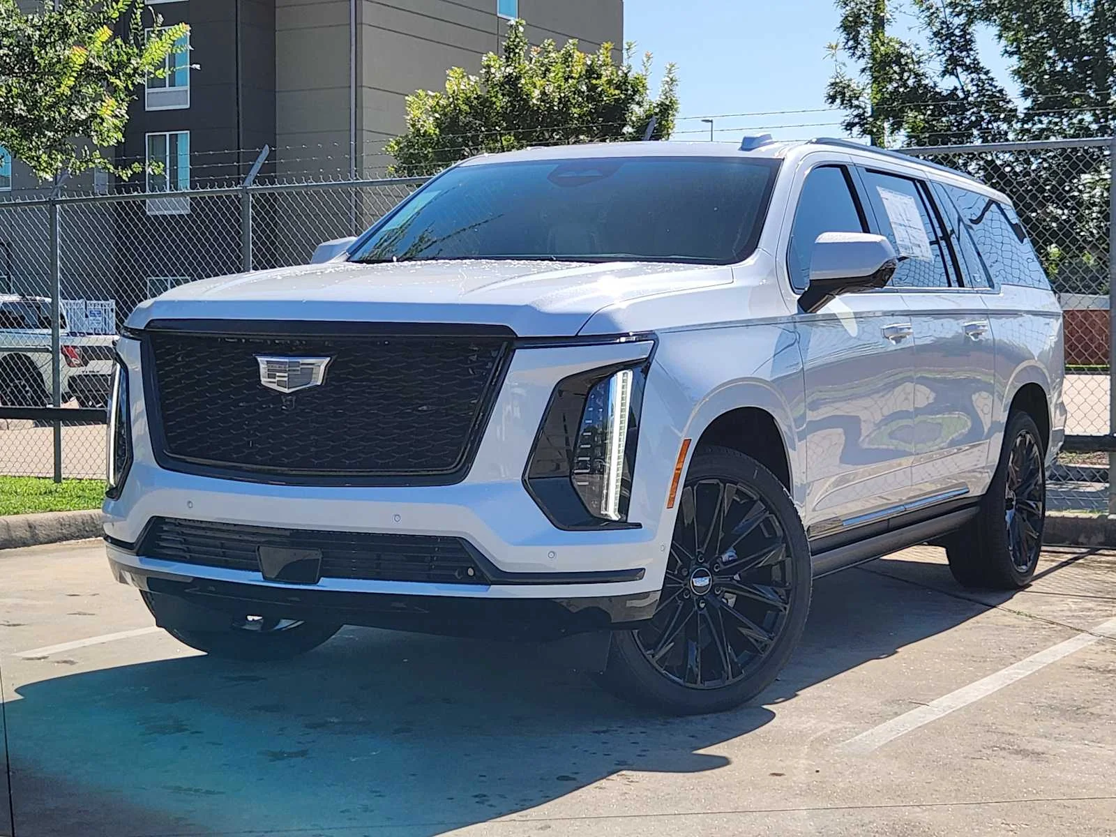 New 2026 Vibrant White Tricoat Cadillac Platinum Sport image 1