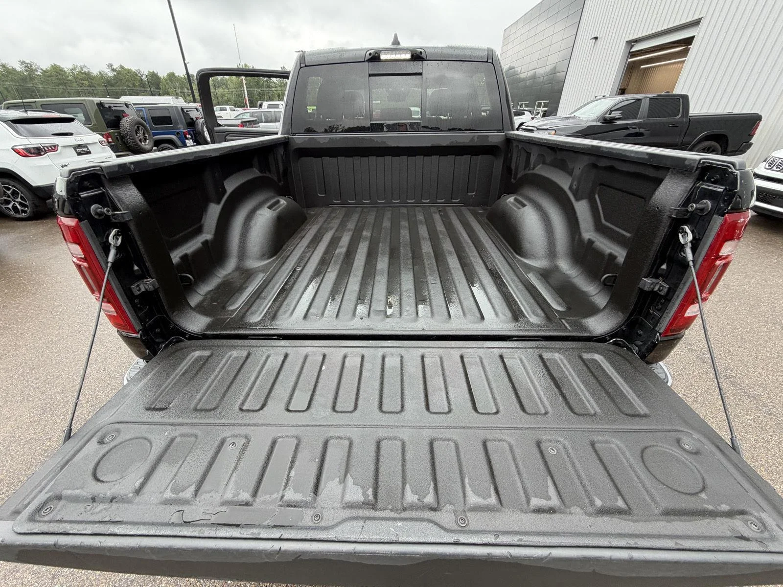 Used 2024 Diamond Black Crystal Pearlcoat Ram Limited image 24