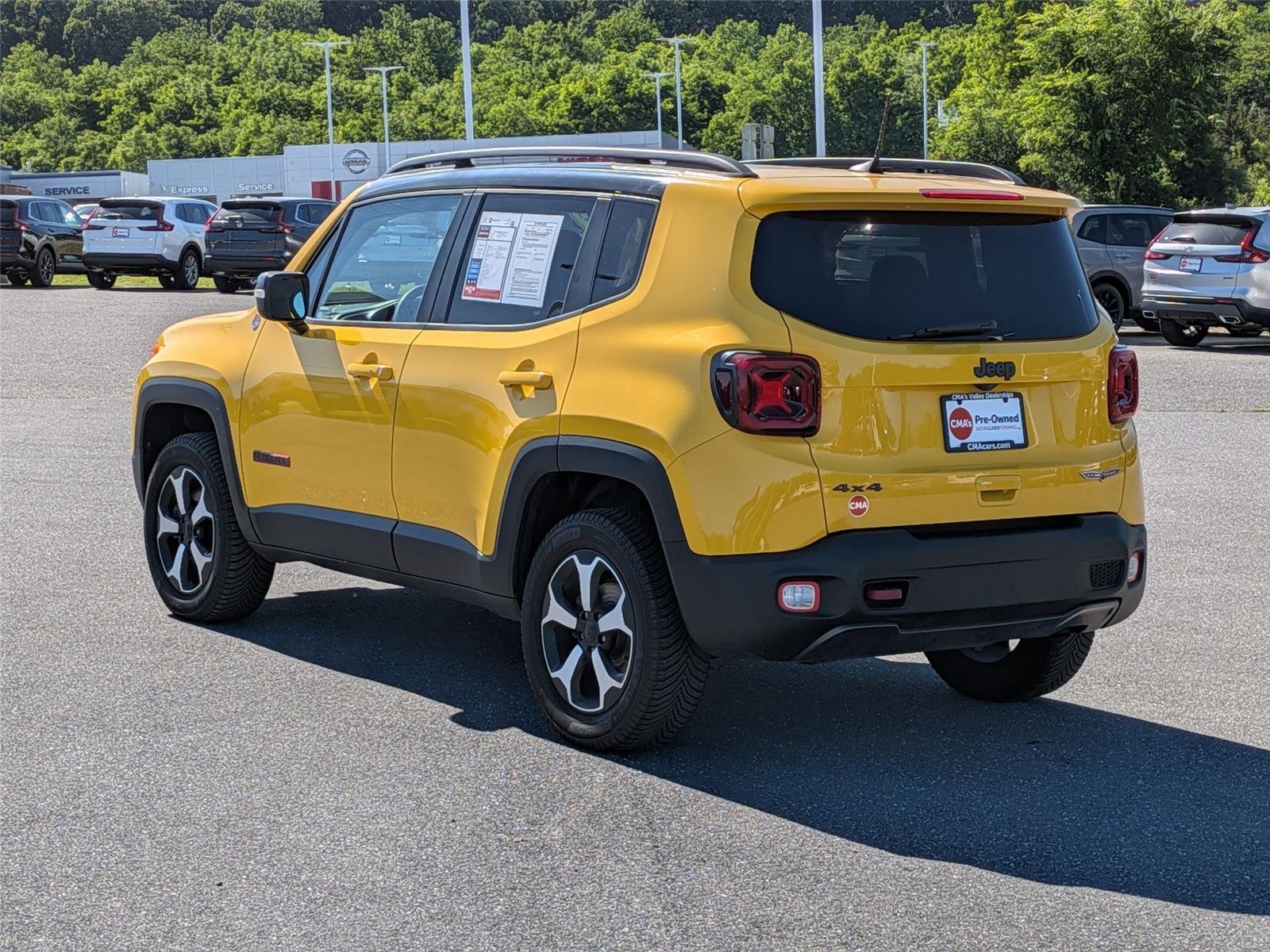 Used 2019 Solar Yellow Clearcoat Jeep Trailhawk image 7