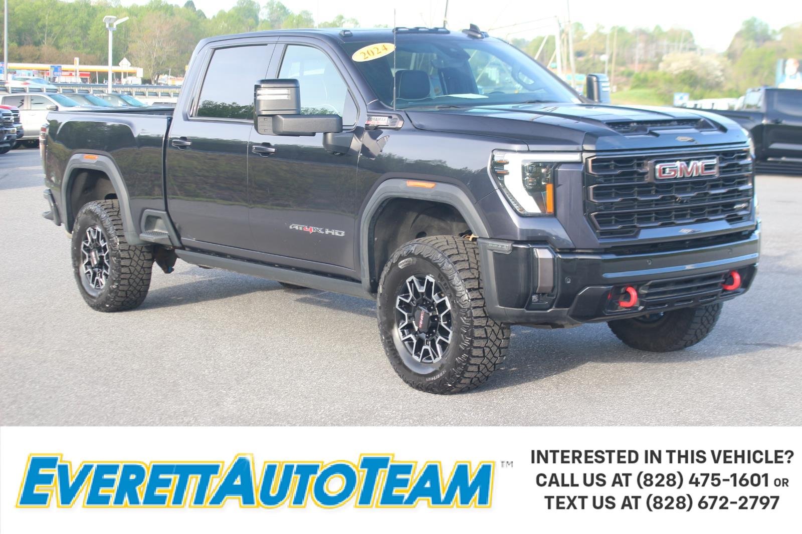 Used 2024 Titanium Rush Metallic GMC AT4X image 1