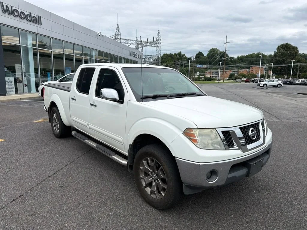 Used 2016 Glacier White Nissan SL image 1