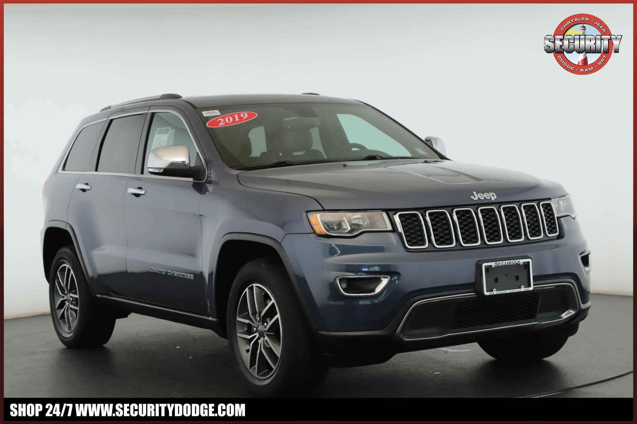 Used 2019 Slate Blue Pearlcoat Jeep Limited 4x4 image 1
