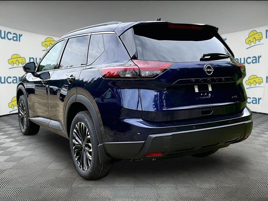 New 2026 Blue Nissan Dark Armor image 3