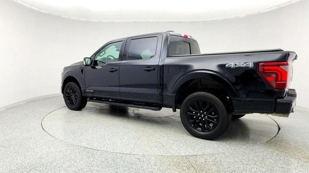 Used 2025 Agate Black Metallic Ford LARIAT 4WD SuperCrew 5.5