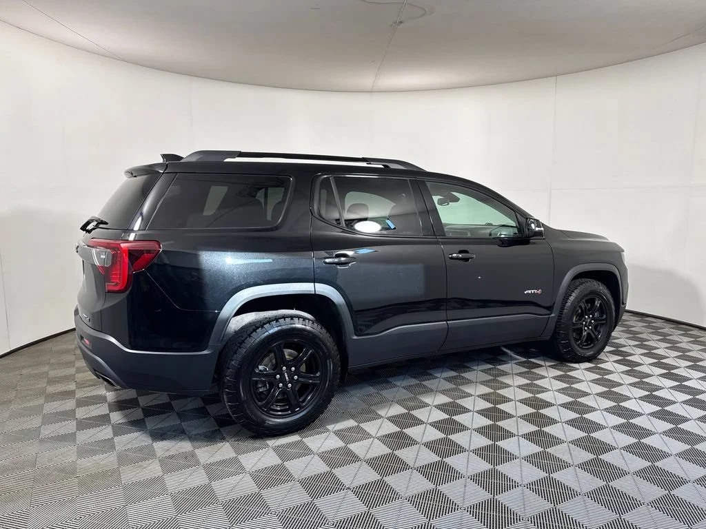 Used 2023 EBONY TWILIGHT METALLIC GMC AT4 image 9