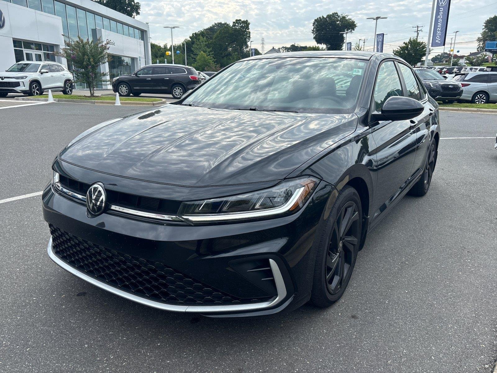 Used 2026 Deep Black Pearl Volkswagen SE image 2