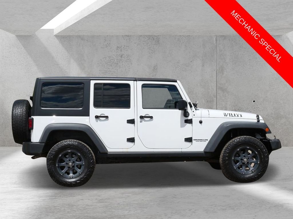 Used 2015 Jeep Wrangler Unlimited Sport with VIN 1C4BJWDG7FL596750 for sale in White Bear Lake, Minnesota