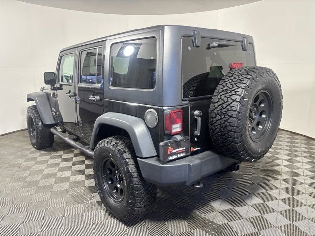 Used 2017 Black Jeep Unlimited Sport image 4