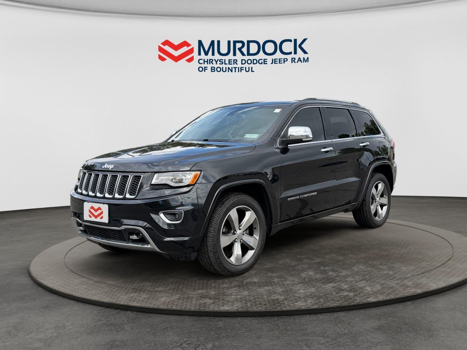 Used 2015 Brilliant Black Crystal Pearlcoat Jeep Overland image 1