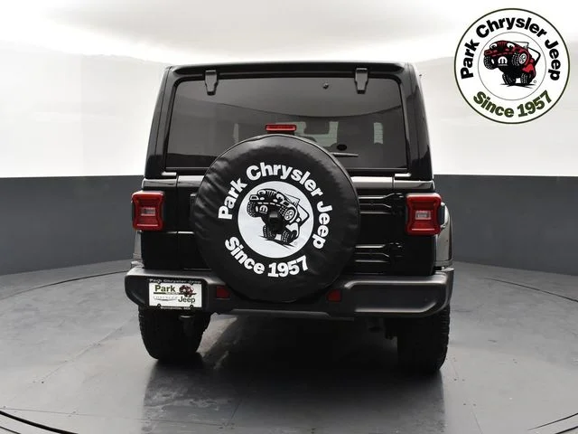 Used 2024 Jeep Wrangler 4-Door Sahara with VIN 1C4PJXEGXRW336422 for sale in Burnsville, Minnesota
