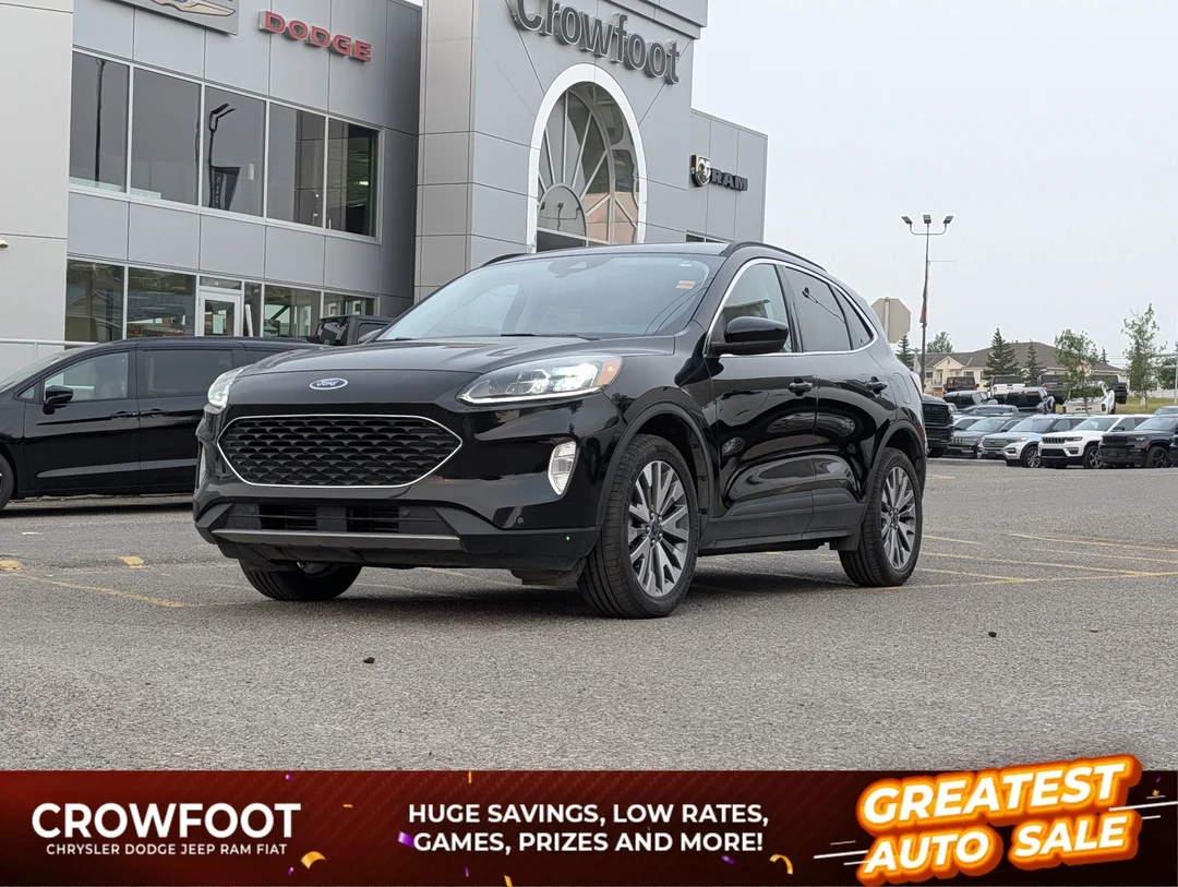 Certified Used 2022 Black Ford Titanium - - AWD - Handsfree Liftgate - Lane Keep - Fordpass Connect - Adaptive Cruise & More! image 1