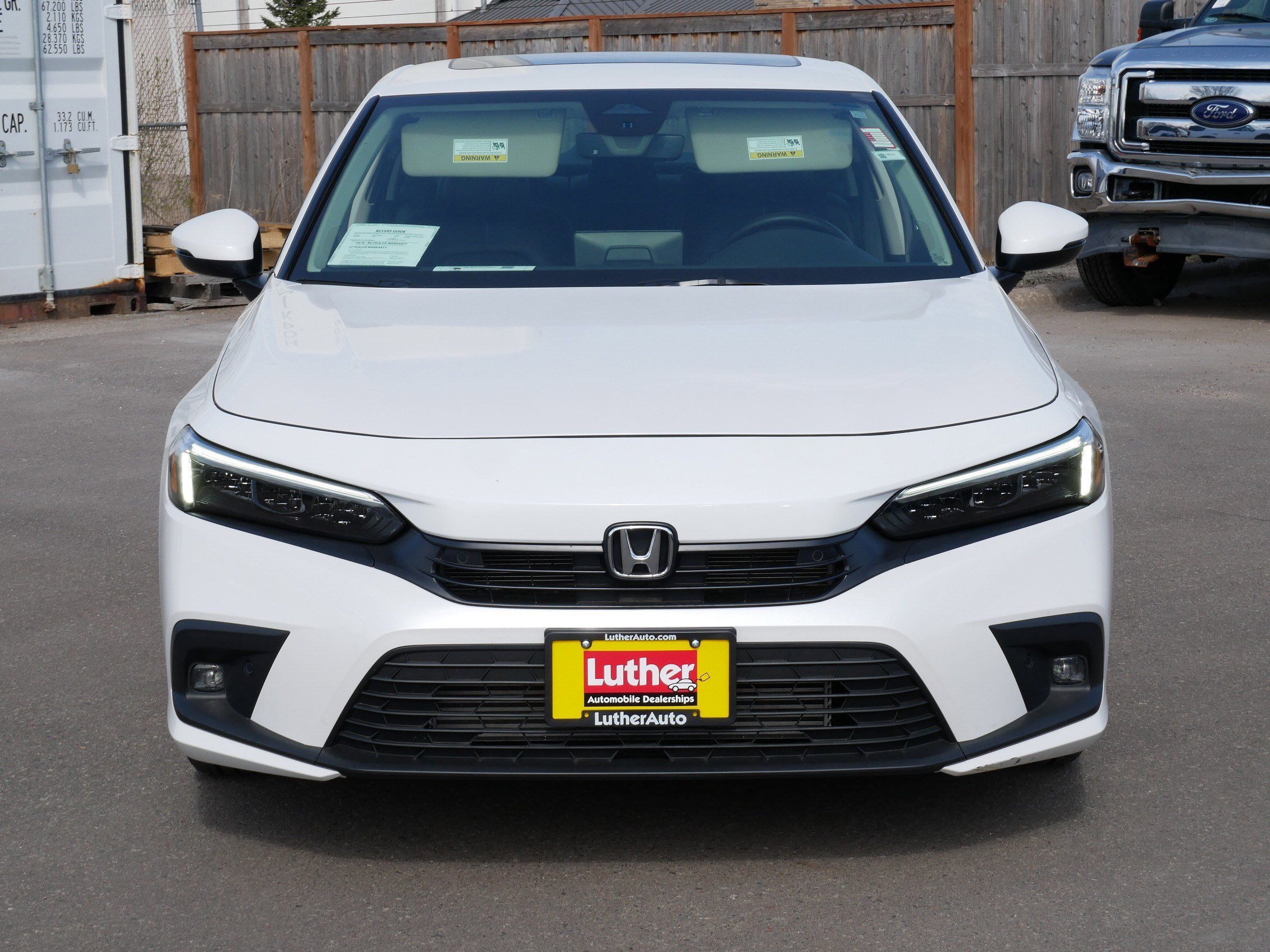 Certified 2023 Honda Civic Touring with VIN 2HGFE1F9XPH318397 for sale in Hopkins, Minnesota