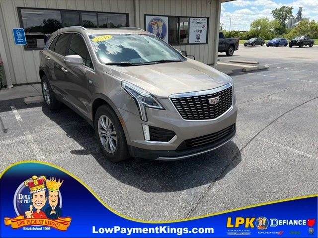 Used 2023 Latte Metallic Cadillac Premium Luxury image 1