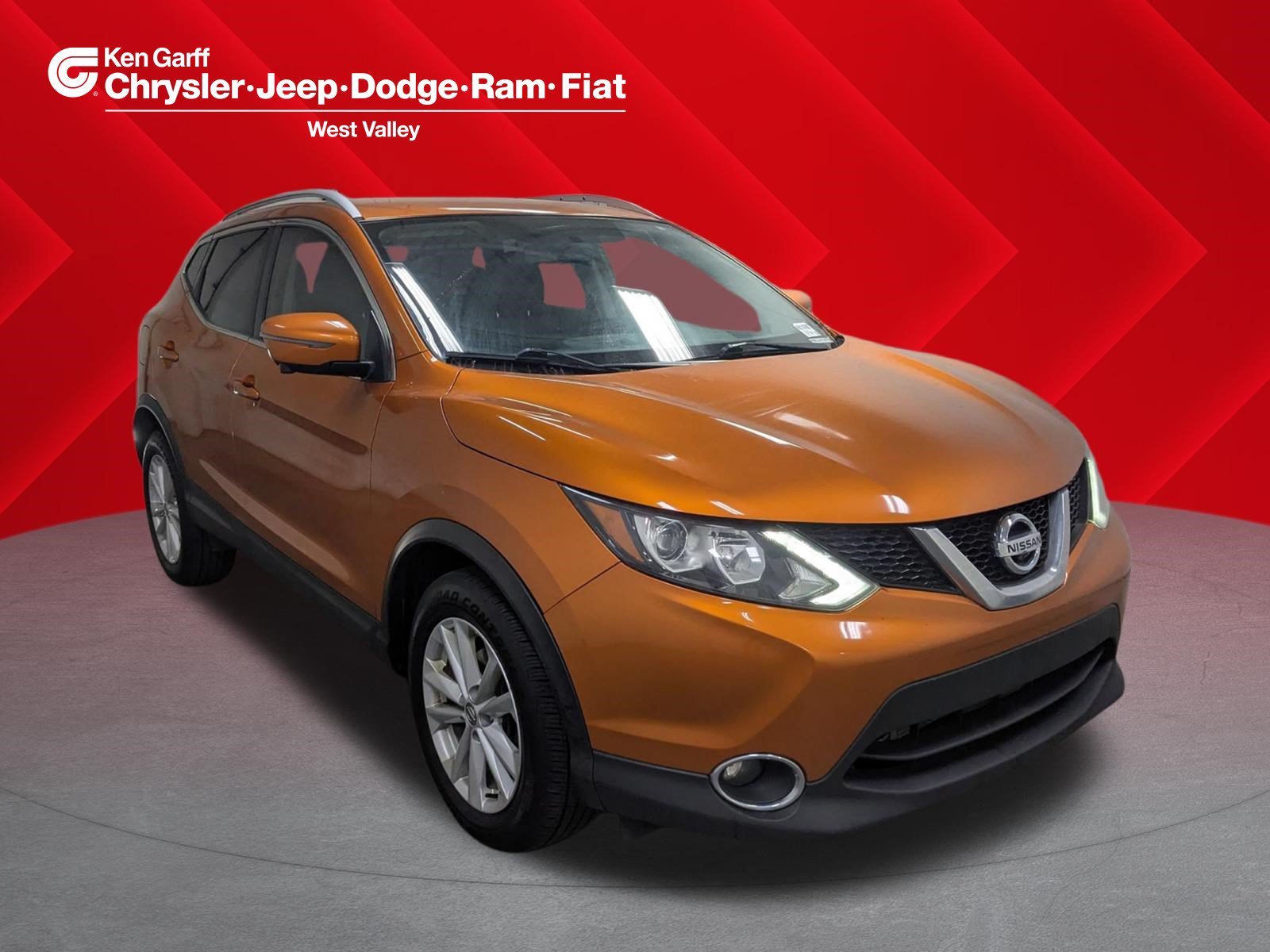 Used 2017 Monarch Orange Nissan SV image 1